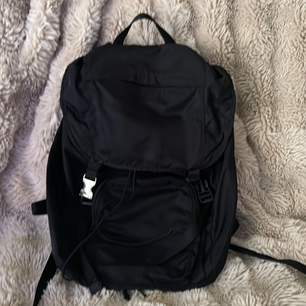Black product backpack original owner